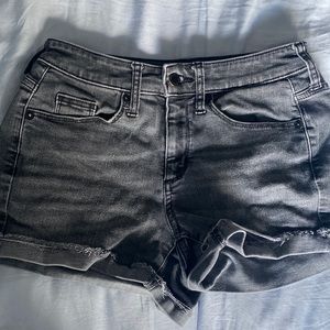 Stretchy black denim shorts
